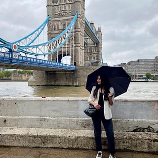 All Black Outfit With a Chic Python Accent