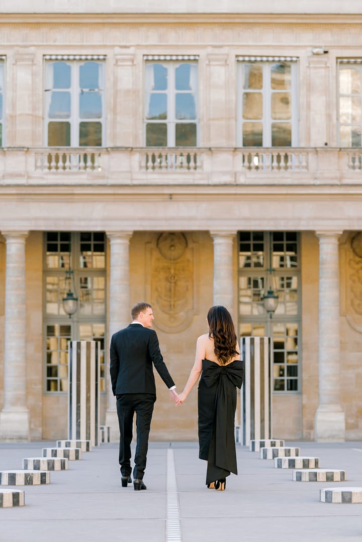 dina and Scott walking outside of Palais-Royal