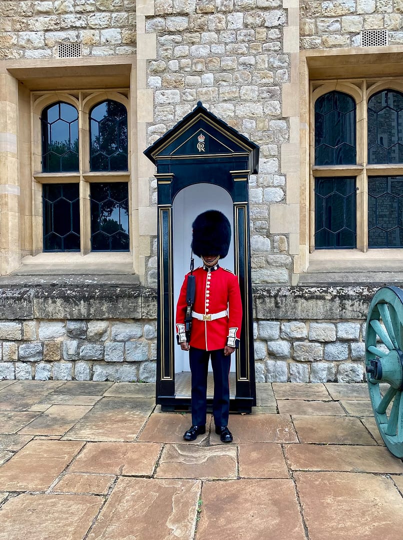A London guard standing near his post.