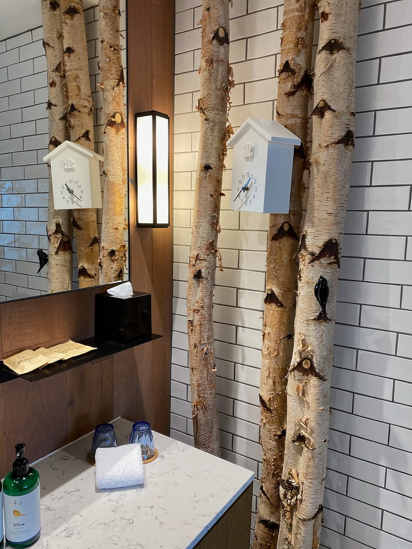 A cuckoo clock inside the bathroom of 1Hotel London.