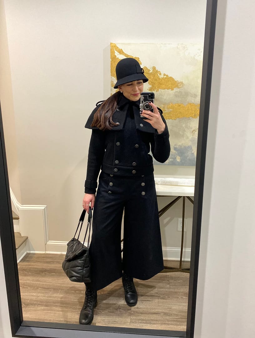 Black on black outfit.