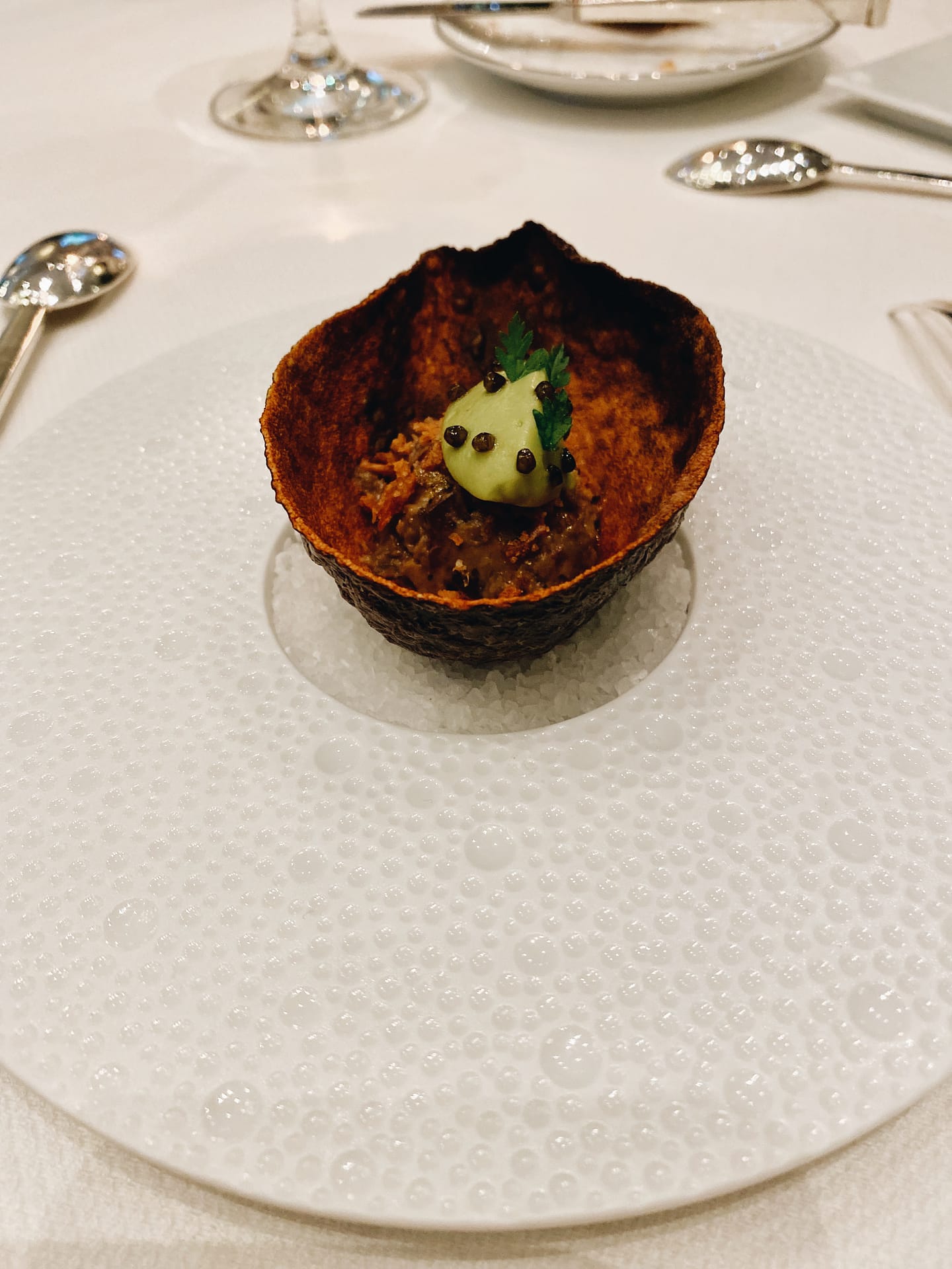 EGGPLANT: Caviar prepared, Avocado cream, and Curry