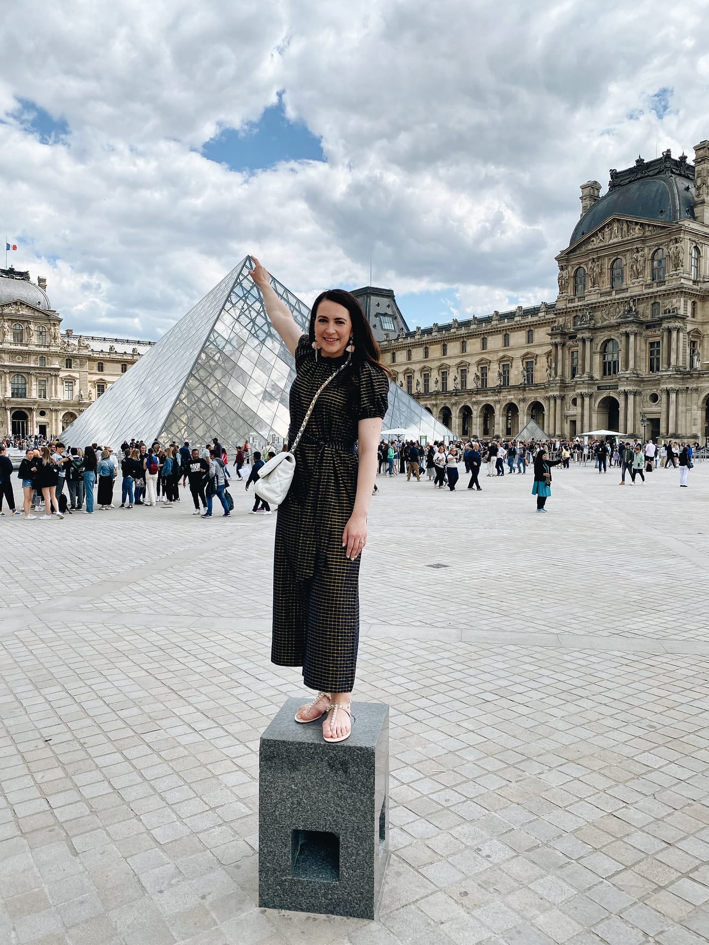 Outside the Louvre in Paris, France.
Jumpsuit: Ulla Johnson  
Handbag: Chanel 
Shoes: Stuart Weitzman