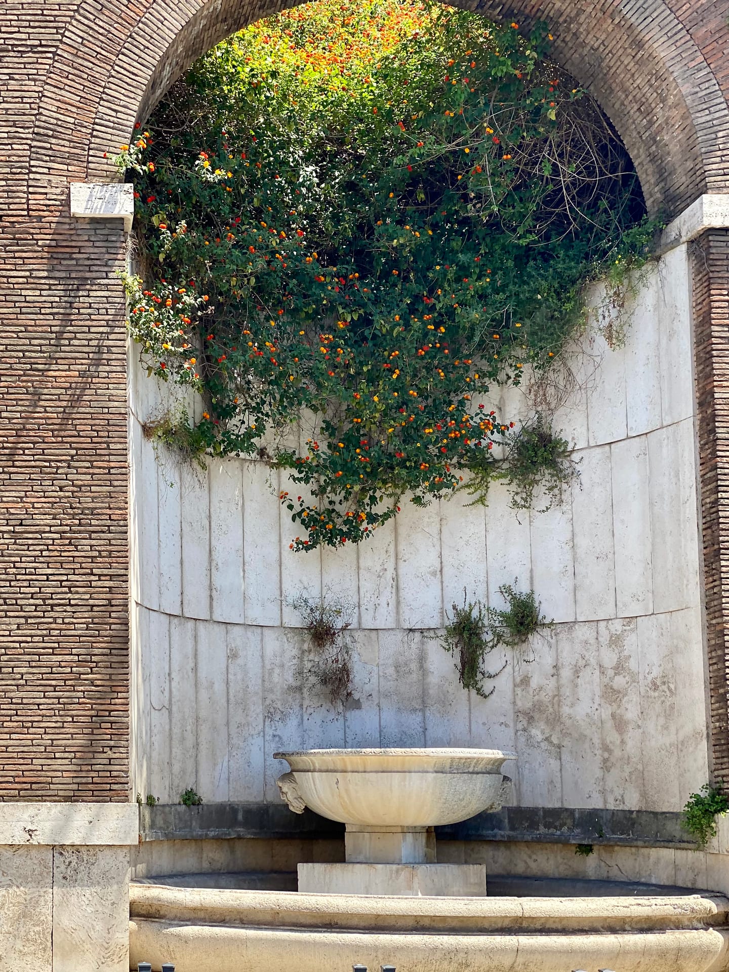 Beautiful fountain found in the streets of Rome.