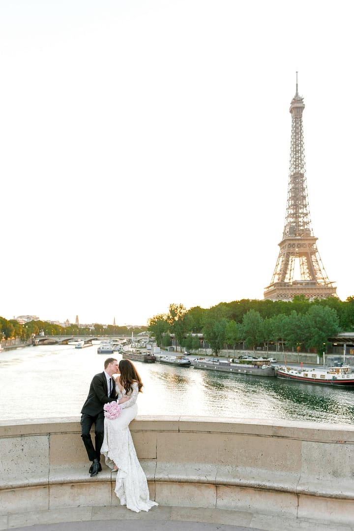 dina and scott kissing in wedding attire 