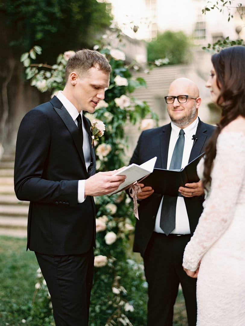 Scott reading his vows at altar